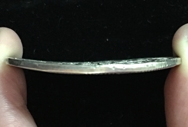 钱币有瑕疵还有收藏价值吗,钱币有瑕疵