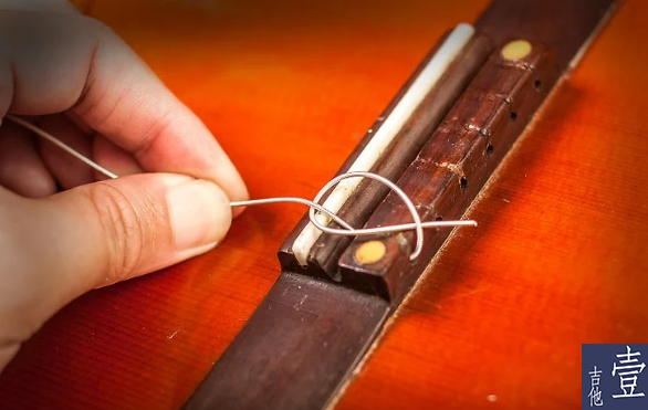 北航吉他,如何换吉他新弦