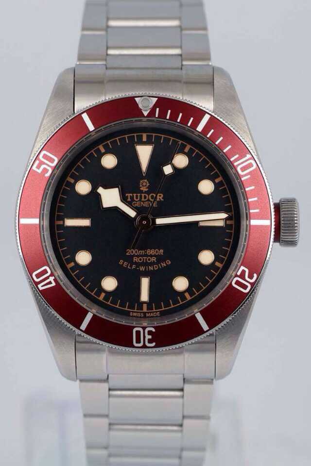 帝舵小黑花看着像劳力士 (帝舵小红花和劳力士logo)