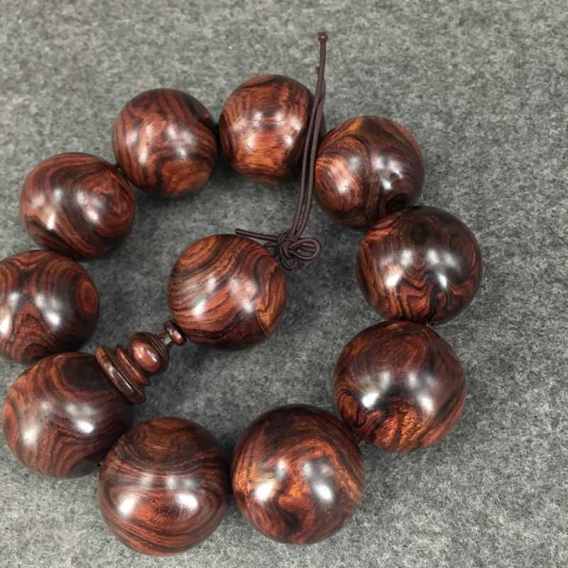 紫檀柳与黄花梨原木对比,紫檀柳木料和黄花梨