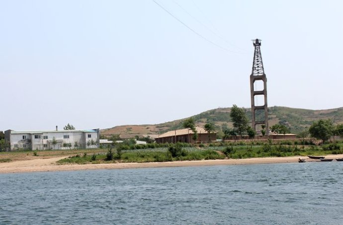 中朝边境美丽的风景,中朝边境桃花盛开的地方