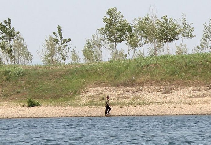 中朝边境美丽的风景,中朝边境桃花盛开的地方