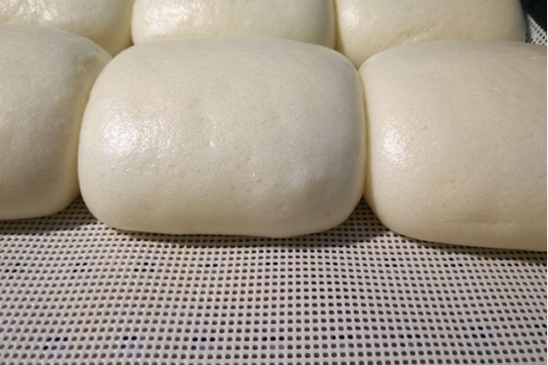 蒸好的馒头开裂是什么原因,馒头包子开锅塌陷怎么回事