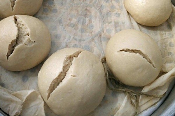 蒸好的馒头开裂是什么原因,馒头包子开锅塌陷怎么回事