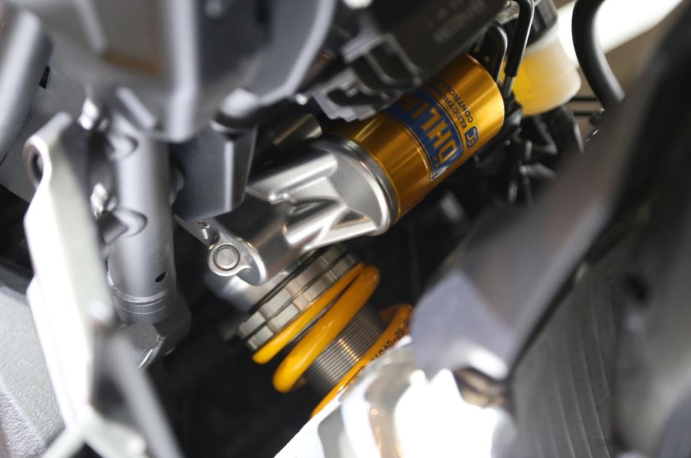 摩托车悬挂系统工作原理,越野摩托车前减震怎么调节