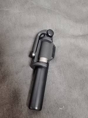 华为三脚架自拍杆af15怎么用,华为有线自拍杆的使用方法及操作