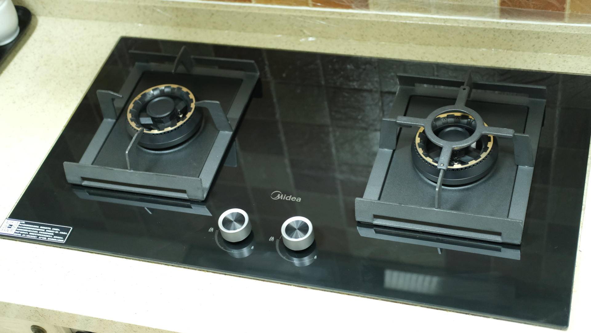 怎样知道燃气灶用了几年了,美的q67燃气灶是高端机吗