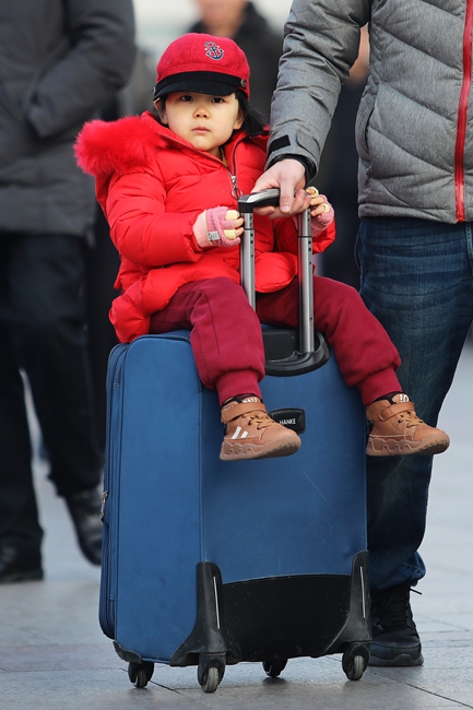 “逆流过年”到北上广深一线城市去