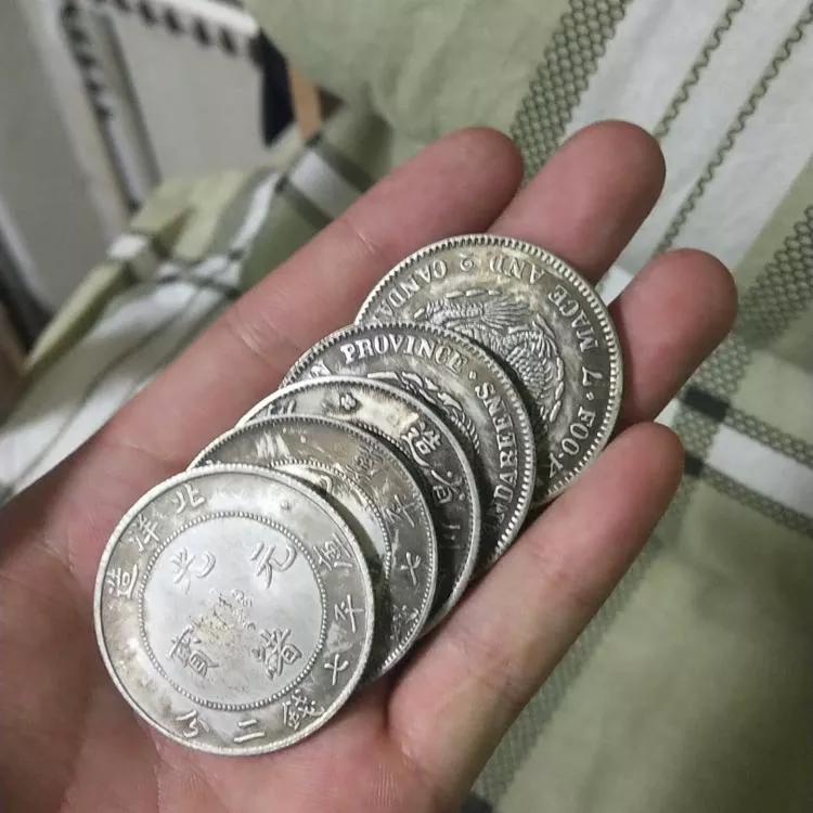 银元锈迹斑斑需要清洗吗,生锈的银币怎么洗