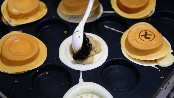 杨家坪大洋百货车轮饼,车轮饼摆摊火爆