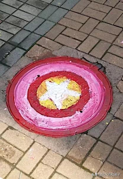 全武汉只有这所大学校门上跑火车，以前嫌弃现在却又舍不得