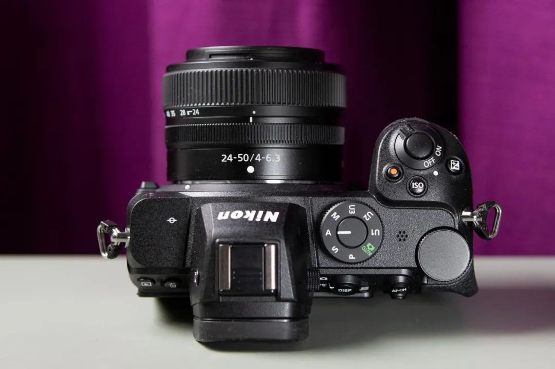 拍照更适合选尼康哪个型号,索尼佳能尼康微单哪个好