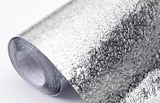 厨房油烟机下面贴油纸,油烟机上面贴纸好清理