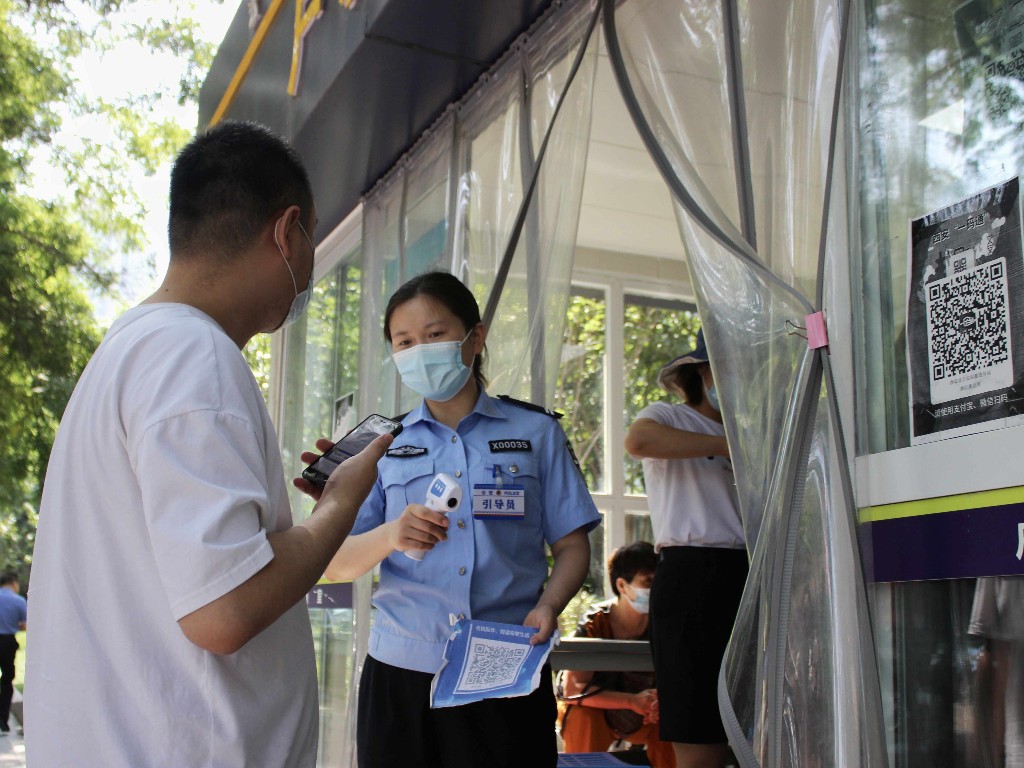 探访西安市业务量最大的户籍室*证办**照片“多拍优选”