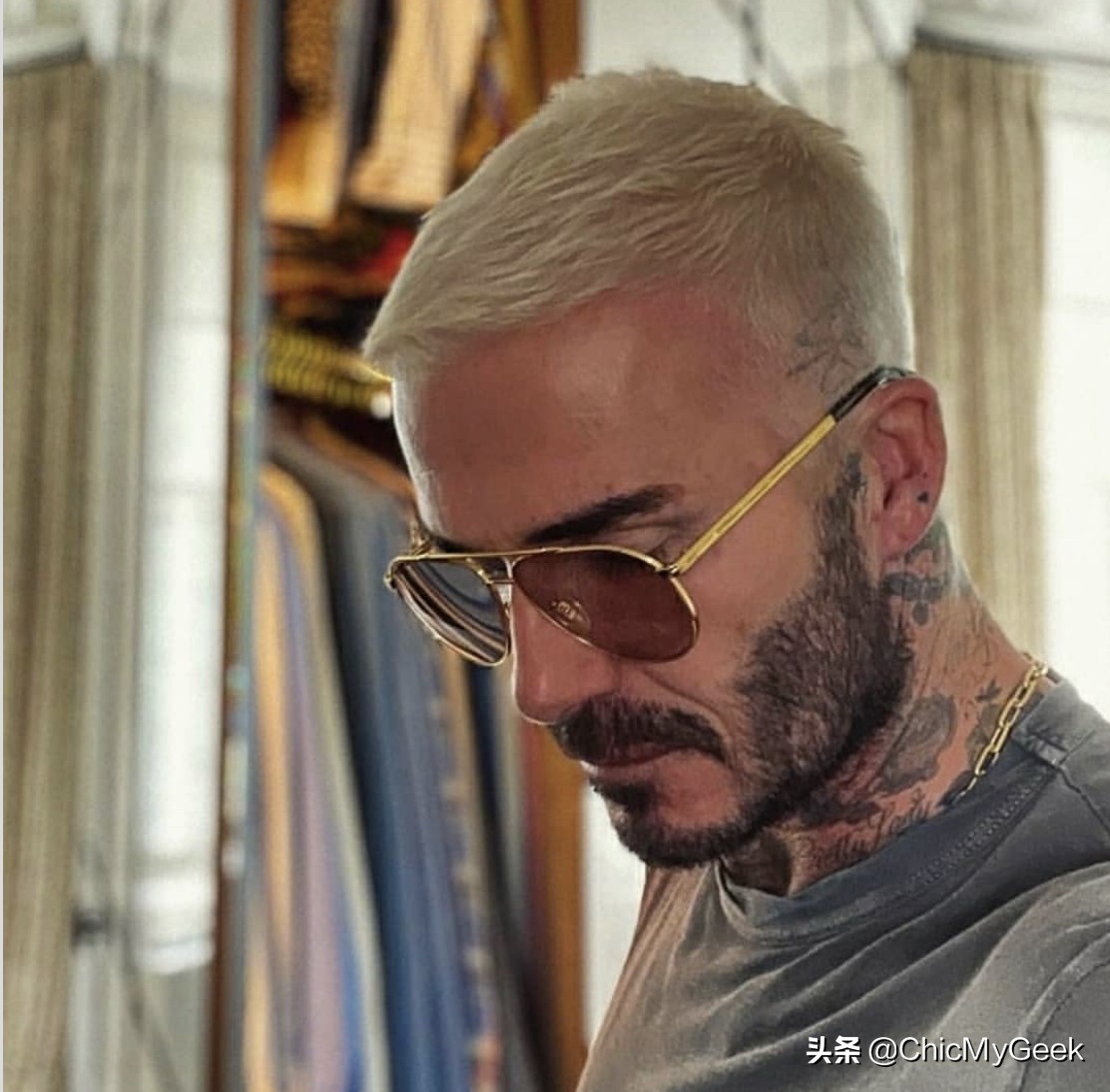 贝克汉姆现在什么发型图片,贝克汉姆和儿子的照片