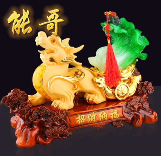 招财辟邪金色貔貅头像,背上有金元宝的貔貅招财纳福