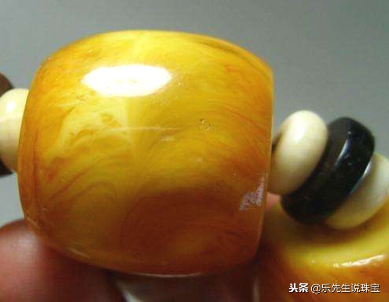 蜜蜡怎么鉴别真假108颗小技巧,如何用紫光灯鉴别蜜蜡真假视频