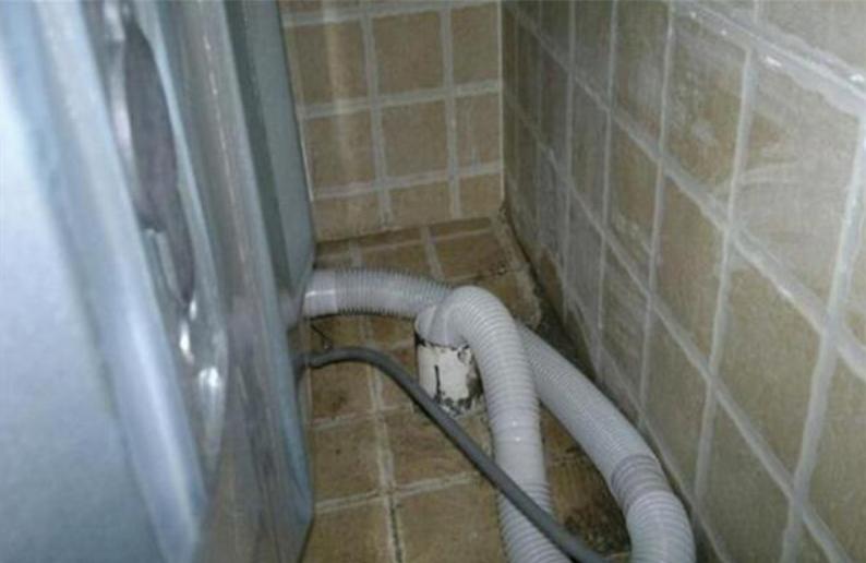 阳台洗衣机下水返水,怎么解决洗衣机下水往上返水