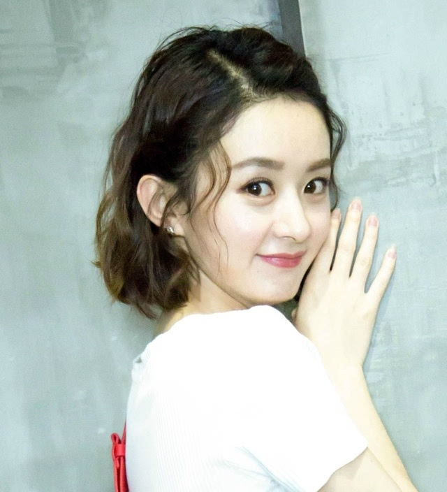 适合圆脸的中分发型,比较适合圆脸的中分发型