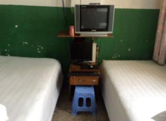 火车站宾馆50元一晚靠谱吗,火车站30块一晚的旅店安全吗