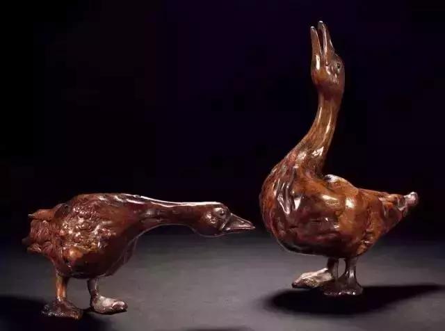 木雕兽头什么寓意,长颈鹿木雕婚礼摆件有什么寓意