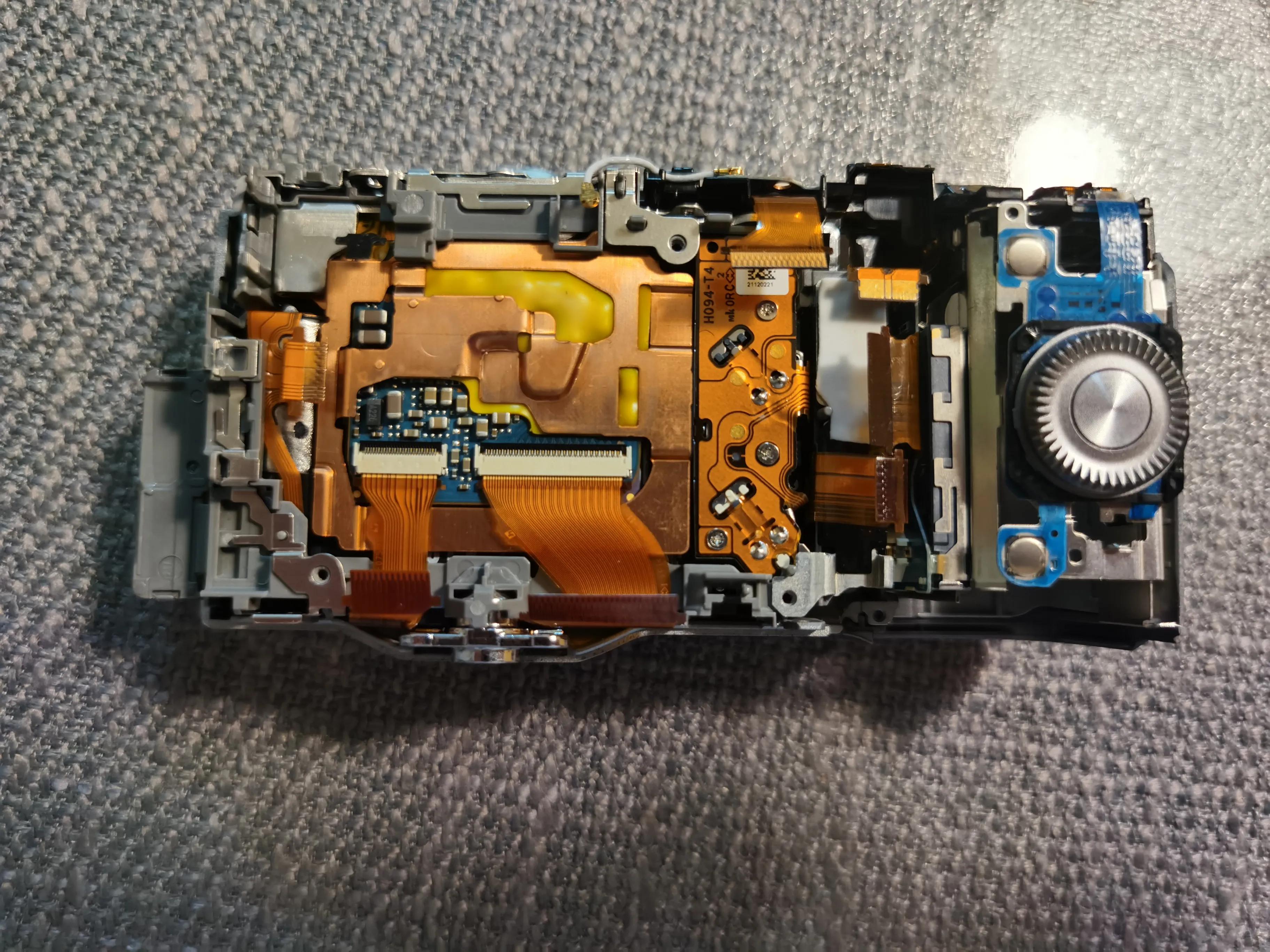 索尼相机更换快门组件,索尼微单相机电池盖拆卸教程