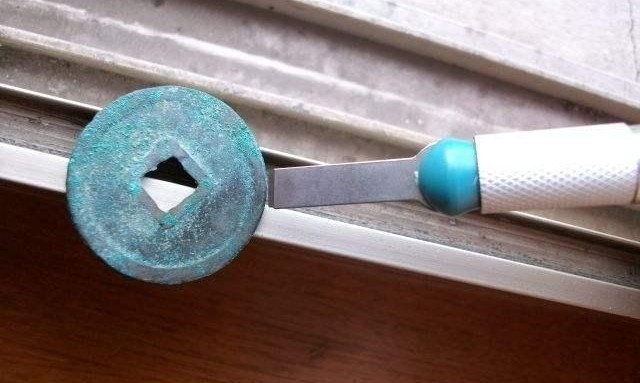 关于铜钱包浆锈蚀的清理