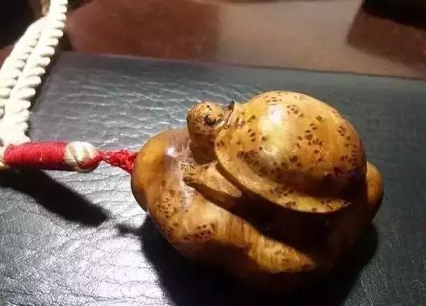 木雕兽头什么寓意,长颈鹿木雕婚礼摆件有什么寓意