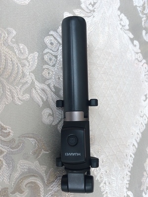 华为有线自拍杆的使用方法及操作,华为手机用自拍杆的使用方法图解