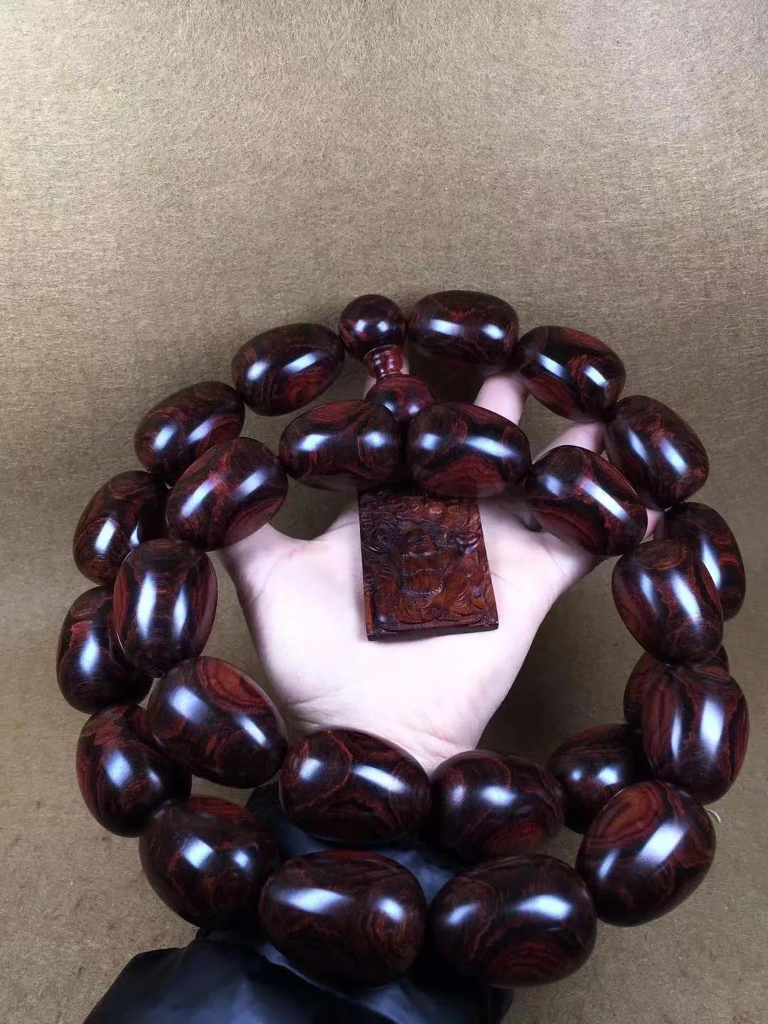 顶级海南黄花梨鬼脸手串,海南黄花梨手串一串多少克