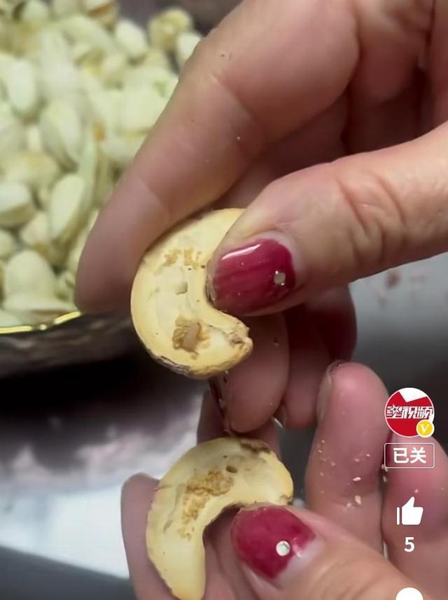 女子吃零食吃到一半发现不对劲,吃坚果吃出巨大虫子
