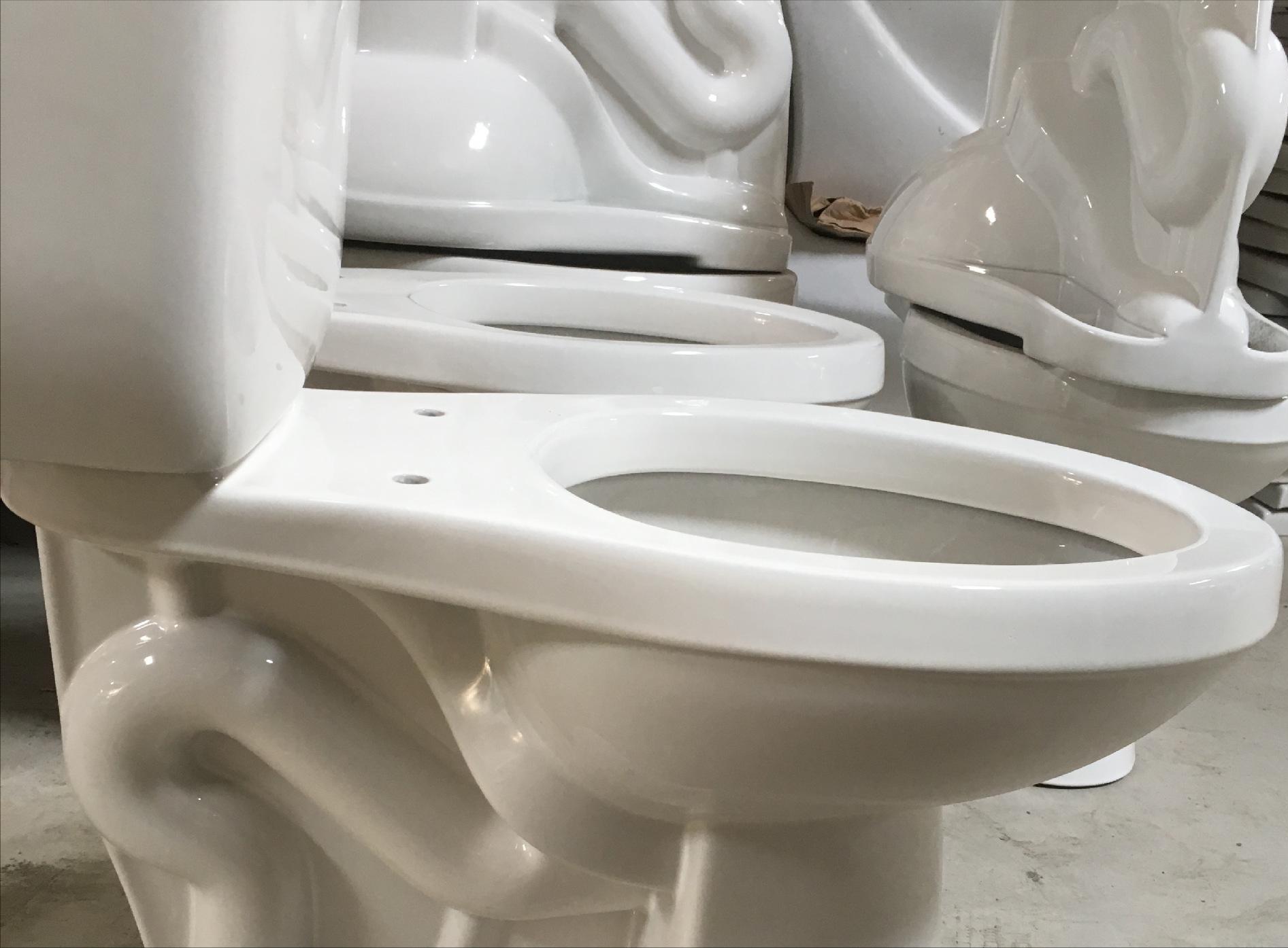 为什么美国的马桶前面有个缺口,美国马桶前面有个缺口