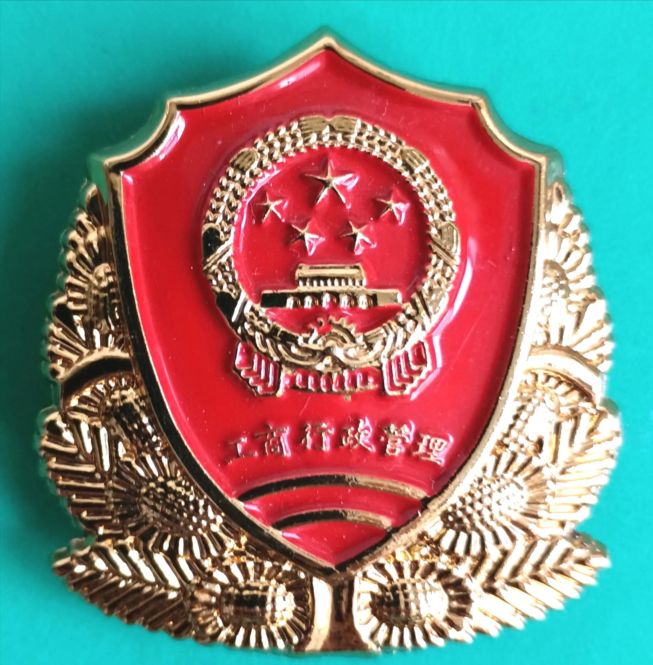 毛启国：*队军***警武**公安消防帽徽鉴赏