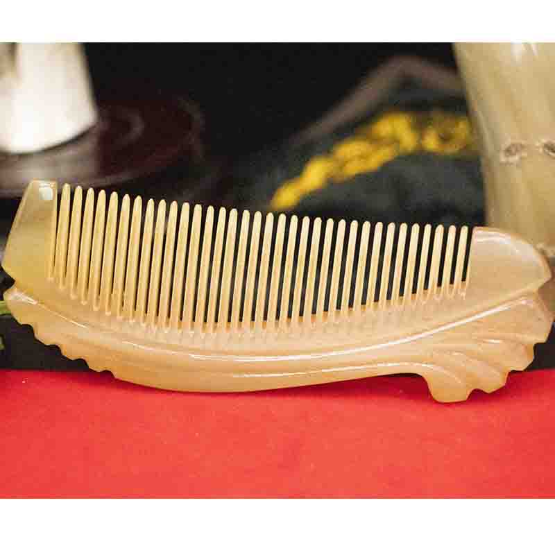 牛角梳价格一般多少,白水牛角梳真假图片