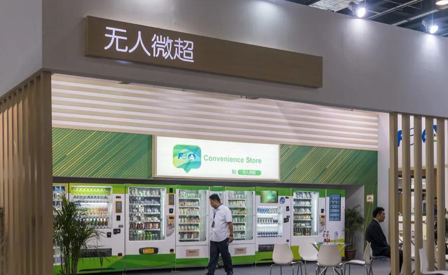 无人自助奶茶机器人加盟多少钱,自助无人创业项目