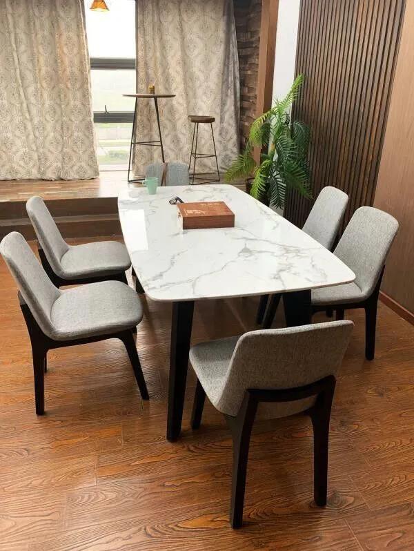 岩板餐桌跟天然石餐桌哪个好,七星石餐桌和岩板餐桌区别