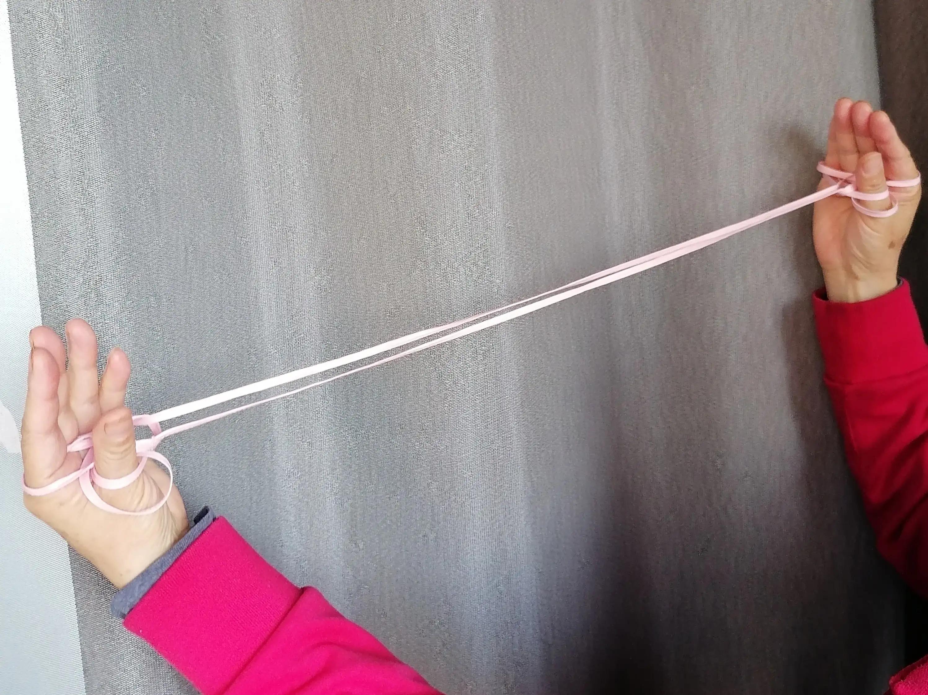 翻花绳游戏过程100字,两人玩的翻花绳游戏小技巧