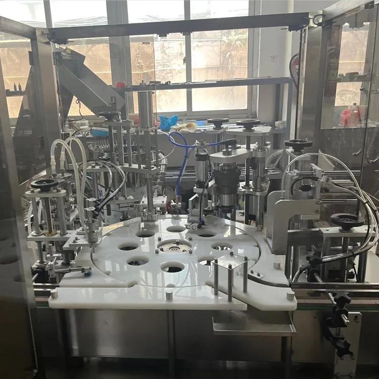 ZHY-50C全自动药品液体*剂喷**灌装机旋盖机