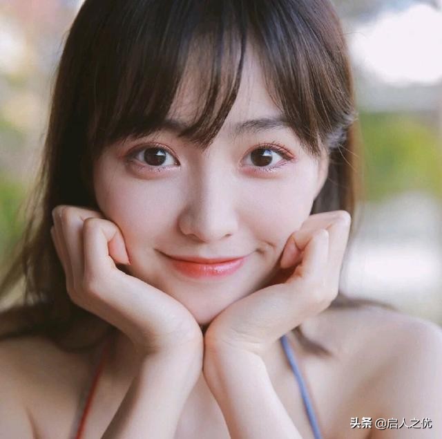 课本眯眯眼争议,小学课本眯眯眼的女孩