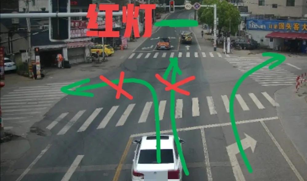 左转车道虚线红灯左转怎么处罚,借道左转弯红灯怎么处罚