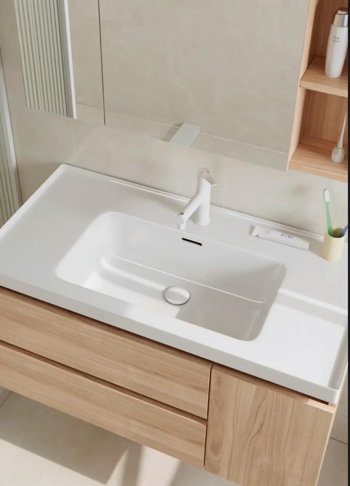 浴室柜一体盆选陶瓷好还是岩板好,浴室柜是用一体陶瓷盆还是大理石