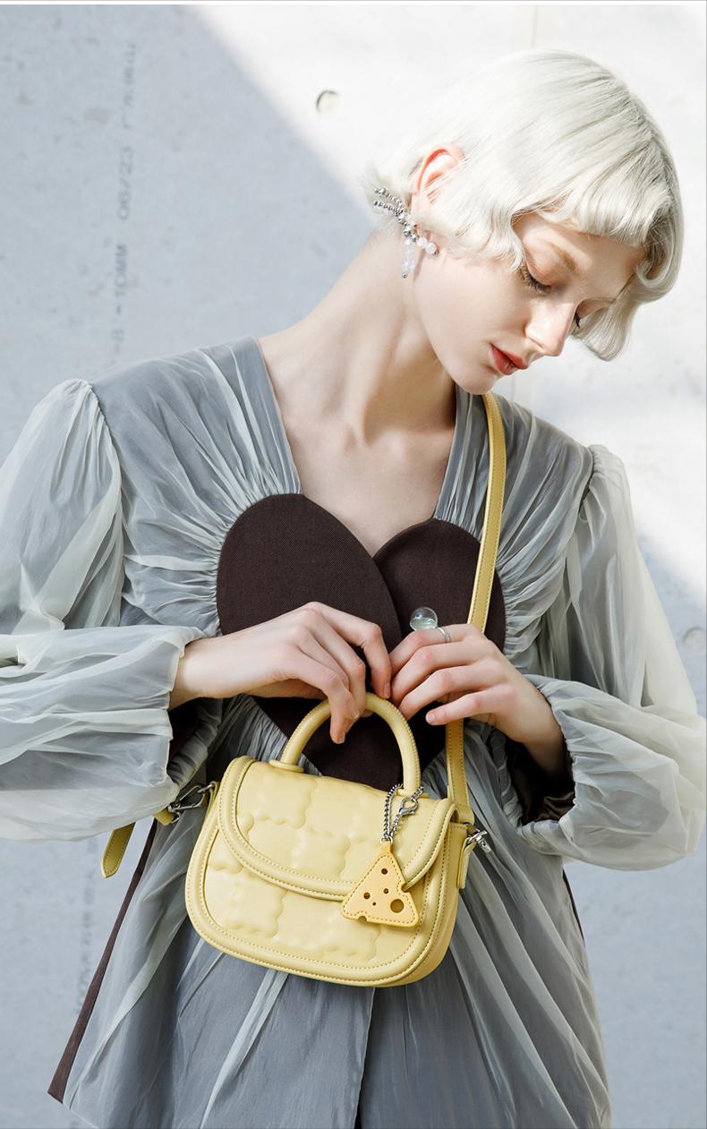 40到50岁女人适合背什么包包,40岁女性背什么牌子的包包