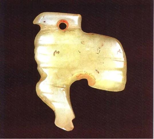 流失海外的商周玉器,商周遗址出土石家河玉器