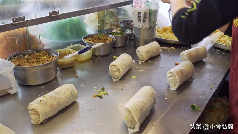 台湾小伙大陆卖小吃,台湾小伙摆摊卖菜饼