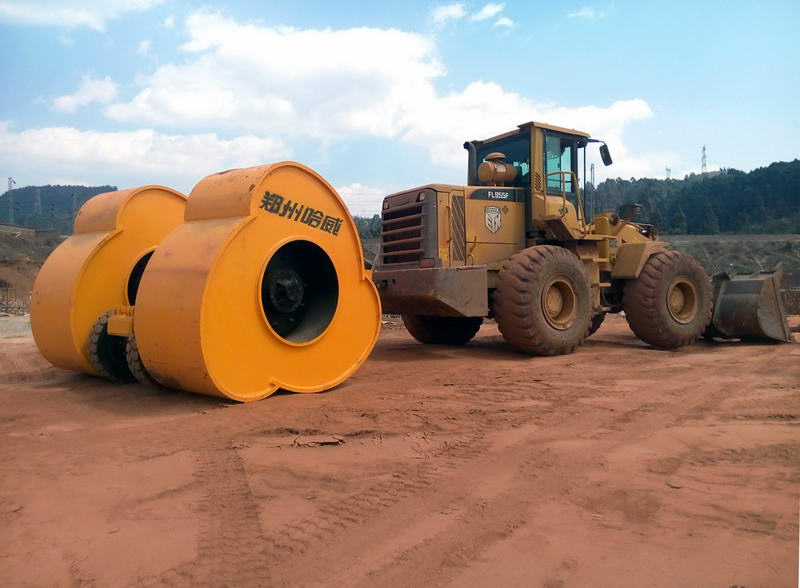 冲击碾压施工中冲击波的传递行程，三角碾的压实遍数