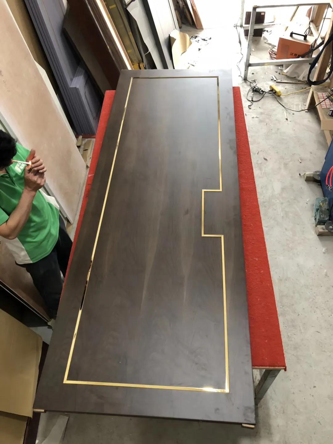 弧形背景墙弧形门套,客厅不锈钢窄边门套造型效果图