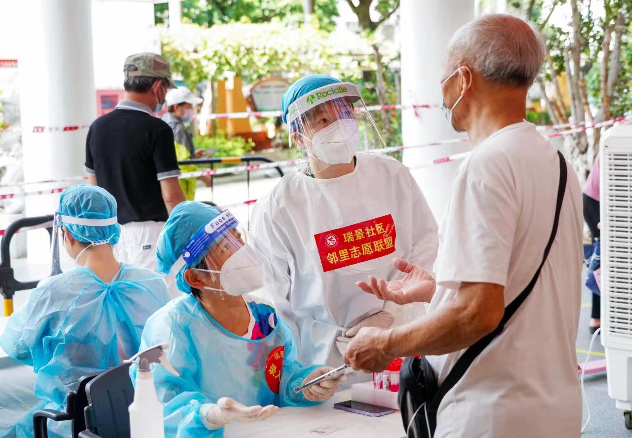 一抹志愿红温暖抗疫路,厦门抗击疫情志愿者