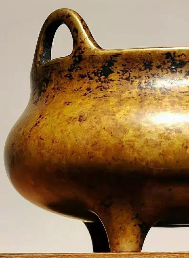 宣德炉黑漆古皮形成原因,珠光宝色的宣德炉