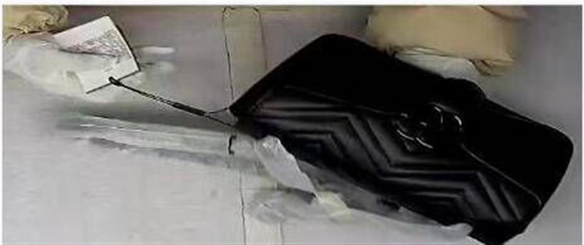 极目3·15丨女子称近2万元在旗舰店买到假古驰包，市监部门介入调查